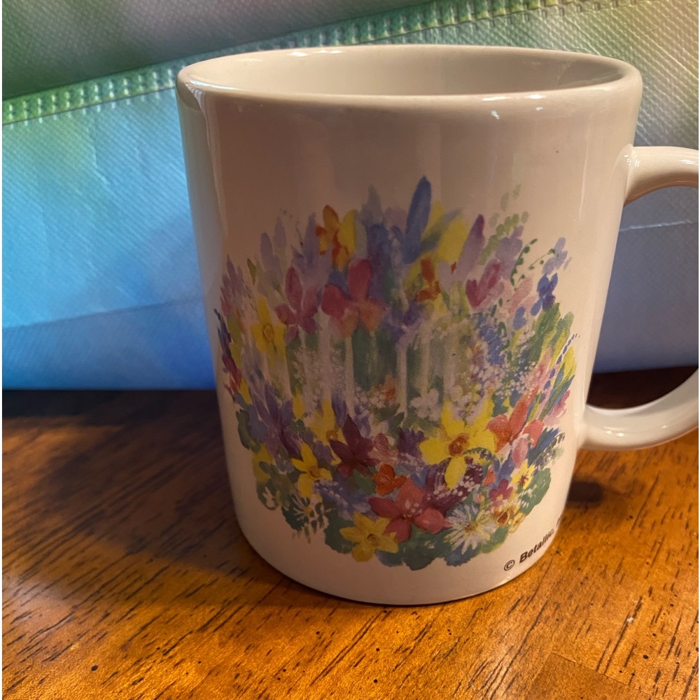 Betallic coffee/tea mug.  Wildflower design.